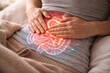 © praewpailyn - Abdominal pain stomach ache digestive system gut health intestinal inflammation irritable bowel stomach cramp chronic pain female patient healthcare concept Abdominal pain stomach ache digestive