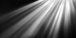 © morepiixel - A dramatic interplay of light beams illuminating particles in a dark space, creating a captivating and ethereal atmosphere.