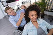© auremar - male hairdresser in wheelchair at work