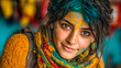 © Passionwith - Indian Woman Celebrates Holi Festival with Color Powder on Face