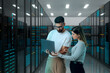 © Rendara Studio - 3D coworkers reviewing server data on laptop screen