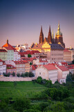 Prague, Czech Republic. Aerial cityscape image of Prague, capital city of Czech Republic with St. Vitus Cathedral at twilight blue hour.