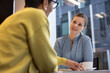© ReeldealHD images - Financial advisor listening to a client in a meeting