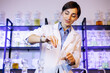 © Petro - Female perfumer crating perfumes at her laboratory