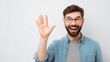 © VictorCanalesStudio - Happy bearded man with glasses waving hand, smiling broadly with an open mouth