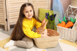 © New Africa - Little girl with cute Easter bunny in wicker basket indoors