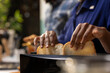 © DC Studio - Close up of young couple taking bread out of the toaster for golden toast in a kitchen, enjoying breakfast meal for a healthy lifestyle with the beauty of mornings at home. Togetherness.