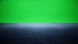 © Adib - A dark, textured surface fades into a green backdrop. Minimalist composition suggesting space and contrast