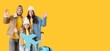© Pixel-Shot - Family of travelers in winter clothes, with paper airplane and suitcase on yellow background with space for text