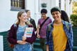 © Rido - Multethnic students laughing outside campus