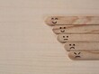 © Eka - Wooden popsicle sticks with different hand drawn faces. represents customer satisfaction ratings and emotional feedback