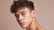 © Marut - Young man with natural male blush tone under soft diffused light, gaze thoughtful and skin texture visible in pastel portrait