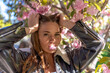 © svetograph - Sakura Woman Jacket: Girl posing with cherry blossom, spring, outdoors for a fashion shoot.
