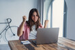 © Daniel - Excited surprised woman looking at laptop screen, reading unexpected good news, getting new job or promotion, funny smiling young female screaming with joy, celebrating online win, feeling amazed