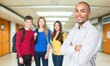 © BillionPhotos.com - Portrait Of Male smart Teacher Standing at College Building