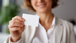 © Kateryna - Hand showing blank loyalty card in crop view, customer displaying empty rewards or membership card closeup, retail program tool with customizable branding space visible, marketing