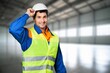 © BillionPhotos.com - Cheerful industrial worker ensuring workplace safety.