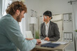 © Miljan Živković - Hr manager interviewing candidate for job position