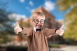 © BillionPhotos.com - Photo of happy small child student in city park
