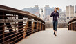 © peopleimages.com - Girl, running and earphones for exercise on bridge, cardio and listen to music for wellness in city. Woman, workout and training with subscription for audio streaming, sound or fitness in urban town