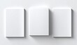 © Ainun - Three plain, white rectangular boxes sit in a row, casting soft shadows