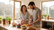 © OlgaNeuroArt - Happy couple laughing while preparing healthy fruit in a sunlit kitchen. Man and woman cutting oranges and berries for breakfast. Healthy lifestyle and domestic life concept
