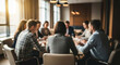 © Rahman - Blurred group of diverse professionals engaged in a collaborative meeting around a conference table in a modern office setting with warm lighting and focused discussion