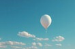 © aboutnuylove - White balloon in the blue sky with clouds. 3d illustration