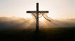 © Joseph - Happy Easter, silhouette of a rustic wooden cross draped with translucent white linen fabric.