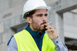 © auremar - a young craftsman smoking outdoors