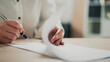 © sebra - Signing documents in the office