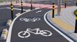 © charlotte - Safe urban cycling infrastructure: clearly marked bike path separated by bollards, supporting eco-friendly and active city commuting.