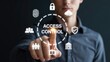 © Arslan - Man touches virtual access control system interface with security and data icons on a dark background