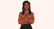 © Kael - An illustration of a smiling Black woman with dreadlocks, wearing a brown blouse and dark skirt, standing with arms crossed.