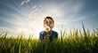 © Guillotine - Young boy blowing dandelion seeds in grassy field at sunset