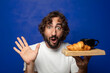 © kues1 - young adult bearded man with a french breakfast