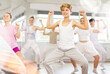 © JackF - Group of teenagers learn to dance hip-hop and other modern dances in a spacious dance studio