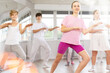 © JackF - Group of teenagers learn to dance hip-hop and other modern dances in a spacious dance studio