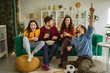 © Miljan Živković - Friends cheering national football team watching game at home