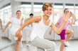 © JackF - Group of teenagers learn to dance hip-hop and other modern dances in a spacious dance studio