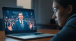 © Guilherme - Woman watching political candidate speech on laptop screen at night