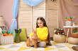 © New Africa - Little girl with cute Easter bunny indoors