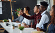 © Hinrichsen/peopleimages.com - Meeting, pointing or team with feedback in office, creative workshop or idea for planning challenge. Brainstorming, laptop or people speaking for decision making, strategy proposal or suggestion