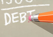 © fStop - Pencil eraser erasing the 'T' from white 'DEBT' text on beige background