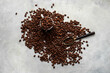 © 9dreamstudio - Flat lay of coffee beans and a cup on stone background, top view. Making coffee concept