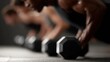 © nanskyblack - group of athletes doing dumbbell push ups together in gym, teamwork and power