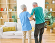© Lumos sp - Doctor or nurse caregiver helping senior man holding walking cane at home or nursing home