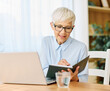 © Lumos sp - Portrait of a mature senior woman a businesswoman working from home having a meeting online, home office, or a student learning, or mature woman surfing net shopping or reading