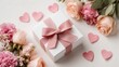 © Sana - pink gift box with satin bow flatlay