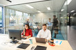 © Santi Nuñez/Stocksy - Team collaborating in a modern coworking office space